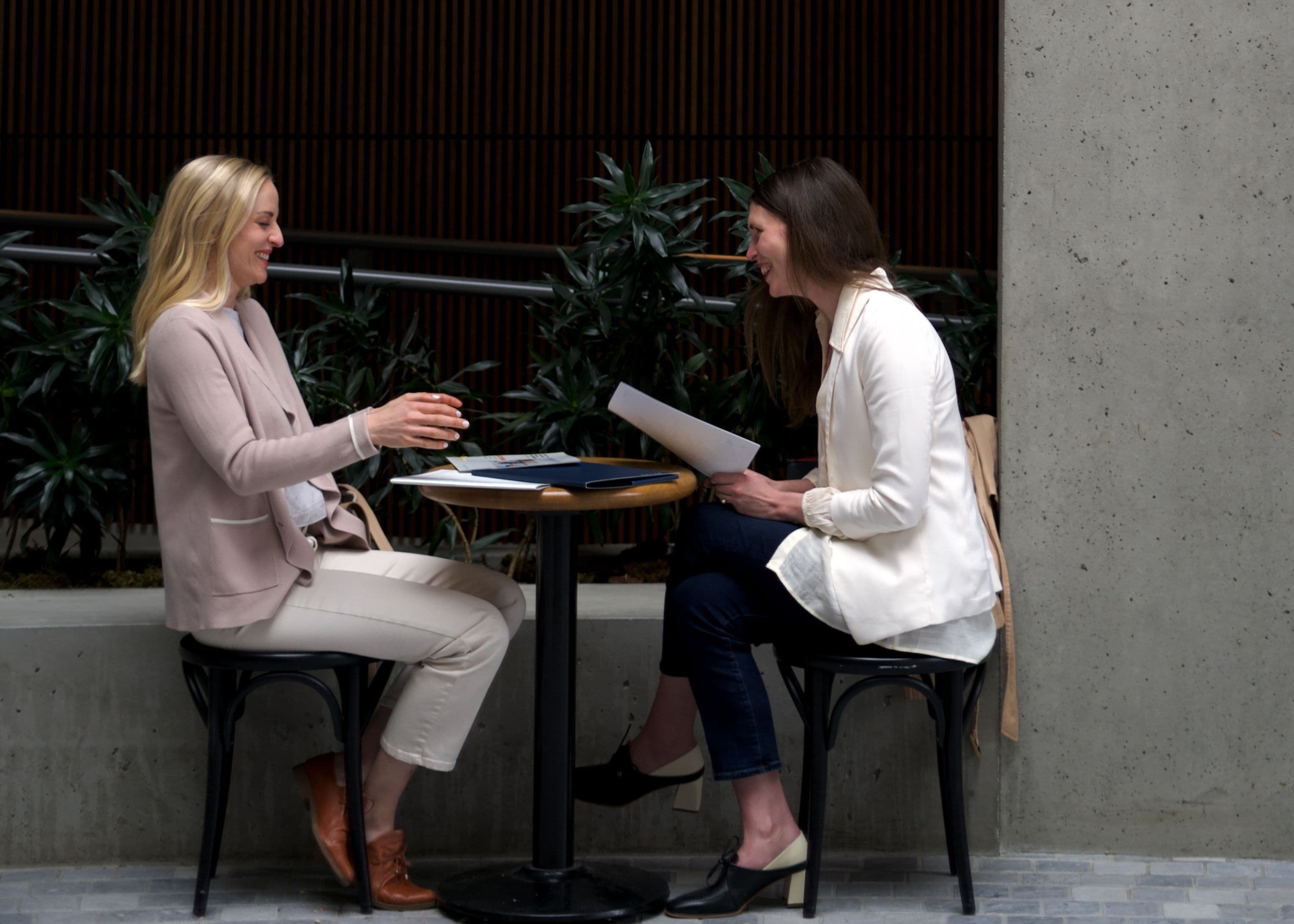 two women in a work meeting