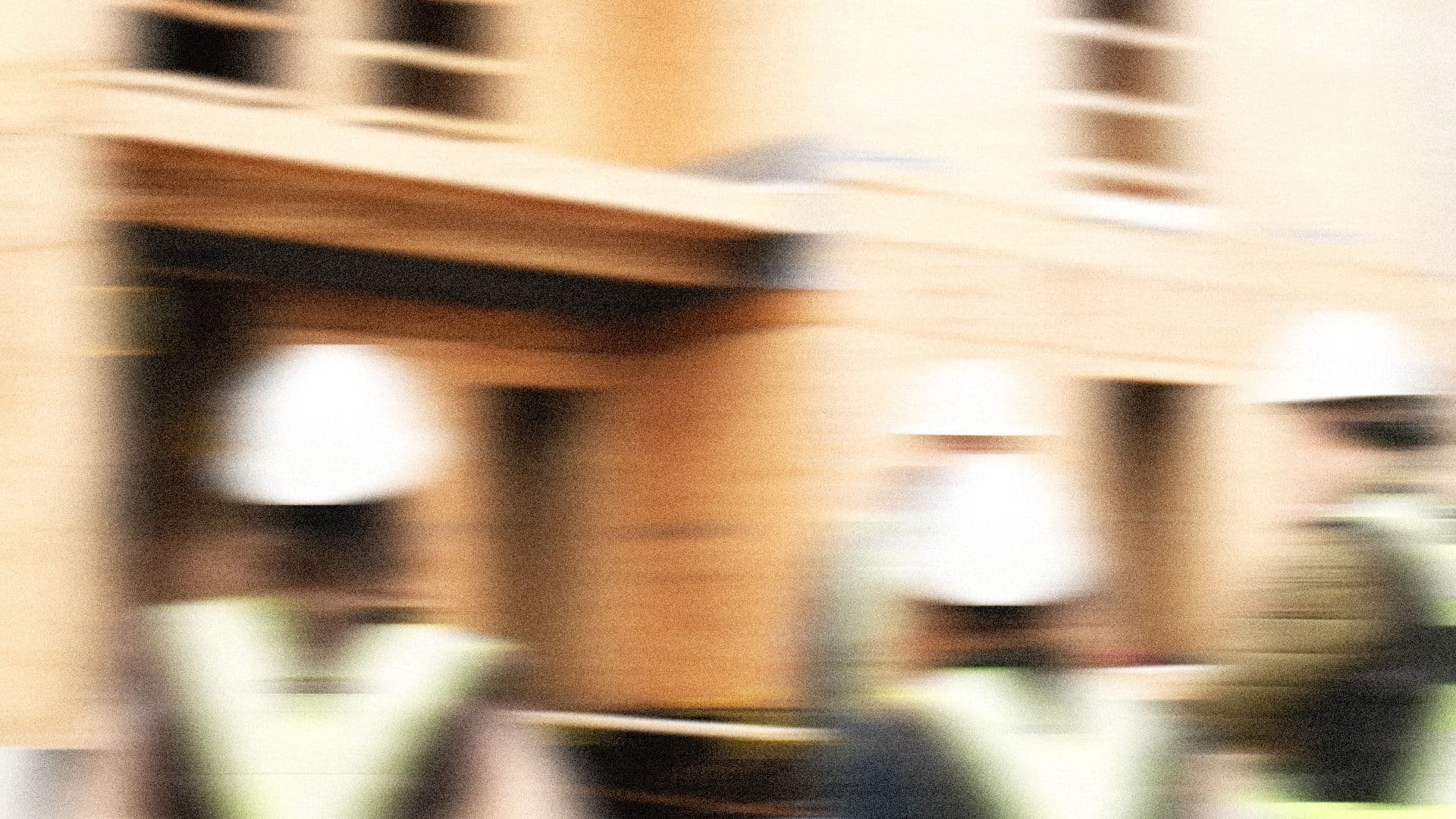 Woman relaxing on yellow couch reading